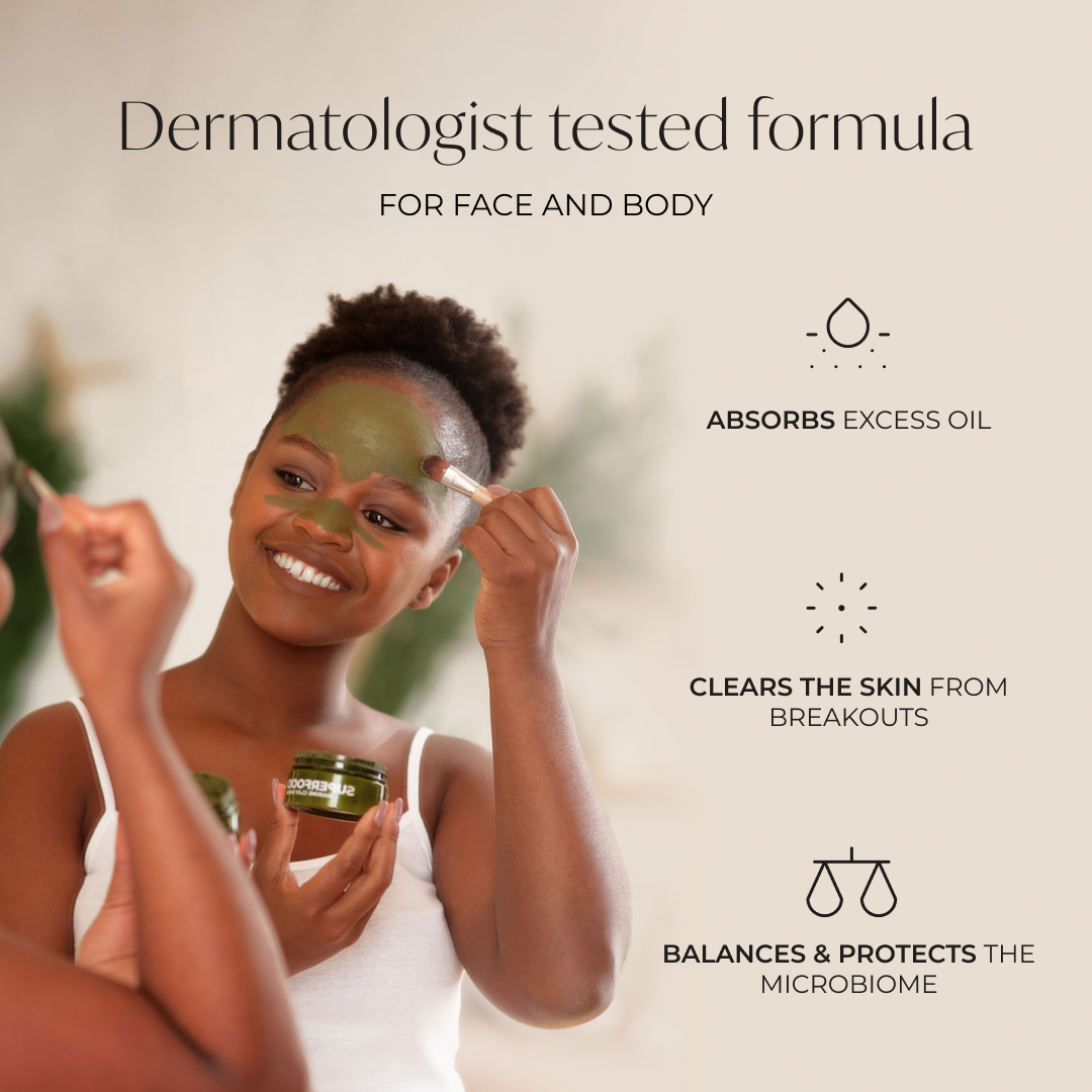 Happy woman applying the Plantifique Superfood Marine Clay Mask