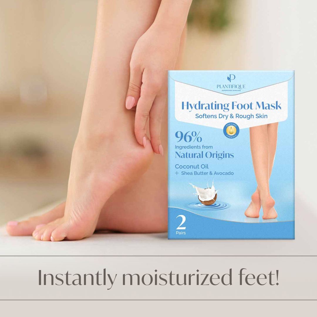 Hand touching soft feet after using the Plantifique Hydrating Foot Mask